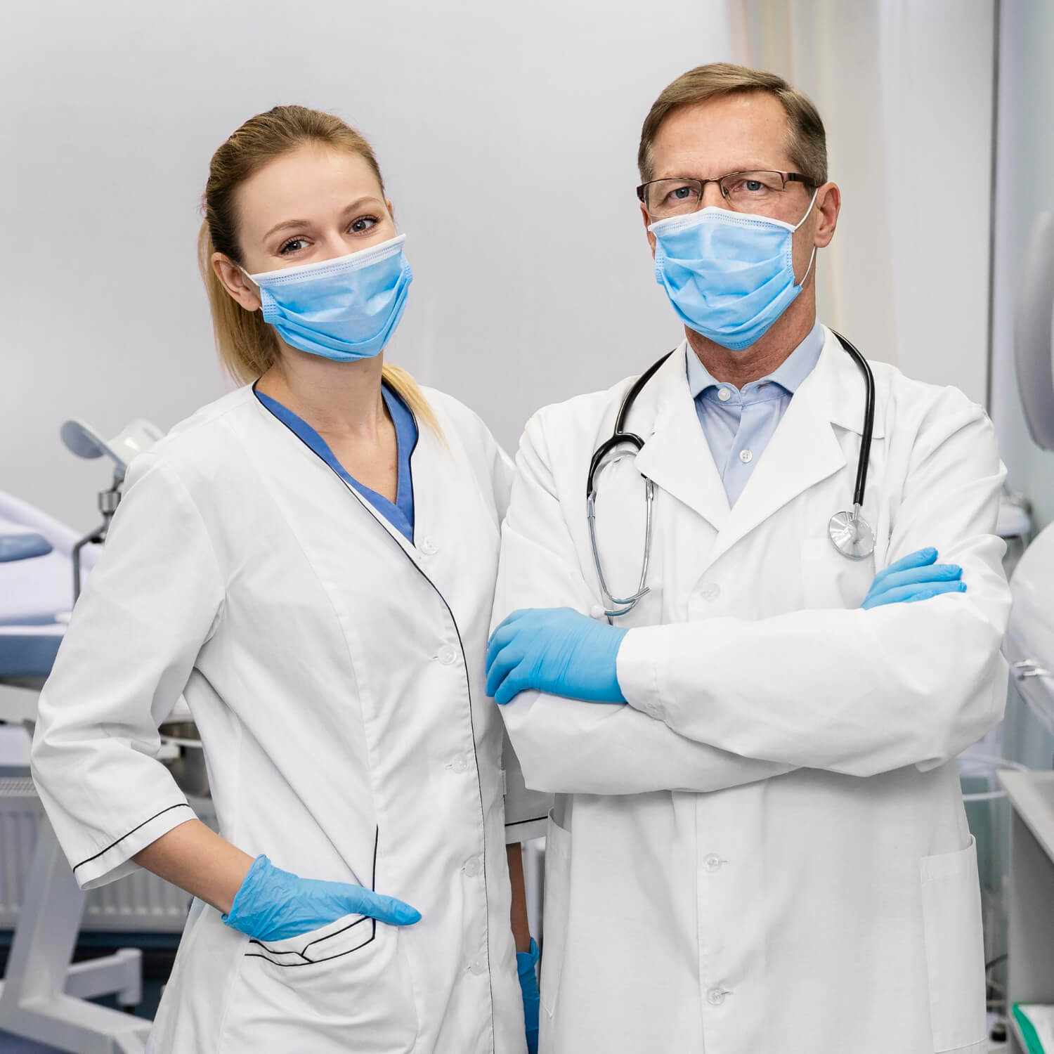 two dentists standing with masks
